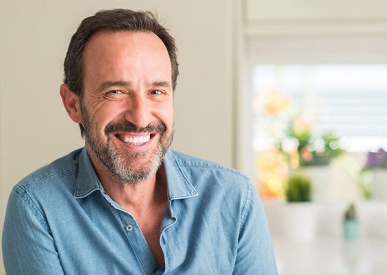 Ponte Vedra Beach patient smiling with dentures